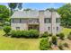 Elegant brick home with a well-manicured lawn, mature trees, and a private backyard is perfect for outdoor living at 4829 Moon Rd, Powder Springs, GA 30127