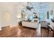 Bright living room with hardwood floors, coffered ceilings, and a cozy fireplace, ideal for gatherings at 4829 Moon Rd, Powder Springs, GA 30127