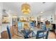 Open floor plan showcasing kitchen, island bar, and living room with natural lighting at 4829 Moon Rd, Powder Springs, GA 30127
