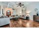 Spacious living room with hardwood floors, plenty of seating, and stylish decor at 4829 Moon Rd, Powder Springs, GA 30127