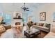 Comfortable living room with hardwood floors, fireplace, and plenty of natural light for relaxation at 4829 Moon Rd, Powder Springs, GA 30127