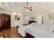 Spacious main bedroom with trey ceilings, hardwood floors, and neutral paint at 4829 Moon Rd, Powder Springs, GA 30127