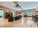 Large recreation room with bar area, theater seating, and a fireplace at 4829 Moon Rd, Powder Springs, GA 30127