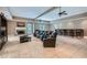 Expansive recreation room featuring a wet bar, fireplace, and comfortable theater-style seating at 4829 Moon Rd, Powder Springs, GA 30127