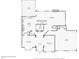 Detailed floor plan of the first level, showcasing the layout of the kitchen, living room, dining room, and garage at 9744 Spyglass Dr, Villa Rica, GA 30180