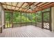 Spacious porch surrounded by nature, providing a peaceful and serene outdoor retreat at 9744 Spyglass Dr, Villa Rica, GA 30180