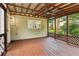 Covered porch with ceiling fan offering views of the backyard, perfect for outdoor living at 9744 Spyglass Dr, Villa Rica, GA 30180