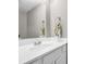 Powder room featuring a white sink and a decorative mirror at 1066 Wedgewood Ln, Tucker, GA 30084