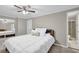 Cozy bedroom showcasing a queen-size bed and adjoining bath at 1066 Wedgewood Ln, Tucker, GA 30084