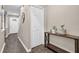 Bright hallway with wood-look floors and a decorative table at 1066 Wedgewood Ln, Tucker, GA 30084