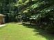 A spacious backyard with lush greenery and mature trees at 2990 Piedmont Dr, Marietta, GA 30066