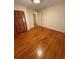 Bedroom with hardwood floors, double closet, and neutral paint at 2990 Piedmont Dr, Marietta, GA 30066