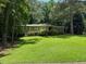 Charming single-story home featuring a brick facade and lush green landscaping at 2990 Piedmont Dr, Marietta, GA 30066