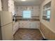 Functional kitchen with white cabinets, updated appliances, and ample counter space at 2990 Piedmont Dr, Marietta, GA 30066