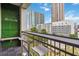 Enjoy the modern outdoor balcony space with city views, bar-height seating, and a unique 'Hotlanta' feature at 390 17Th Nw St # 6055, Atlanta, GA 30363