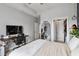 This spacious bedroom features modern amenities including an ensuite and large workstation with computer at 390 17Th Nw St # 6055, Atlanta, GA 30363