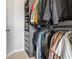 Organized walk-in closet with shelving and hanging space provides ample storage for clothes and accessories at 390 17Th Nw St # 6055, Atlanta, GA 30363