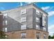 Detailed building exterior highlighting architectural details and window placements at 390 17Th Nw St # 6055, Atlanta, GA 30363