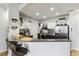 Stylish kitchen features granite countertops, pendant lights, and stainless steel appliances at 390 17Th Nw St # 6055, Atlanta, GA 30363