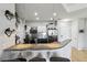 Stylish kitchen featuring a granite countertop bar and stainless steel appliances at 390 17Th Nw St # 6055, Atlanta, GA 30363
