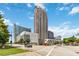 An urban neighborhood with modern high-rise buildings and pedestrian-friendly streets at 390 17Th Nw St # 6055, Atlanta, GA 30363