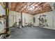 Basement gym featuring rubber flooring and weightlifting equipment, perfect for fitness enthusiasts at 4050 Bonnett Creek Ln, Hoschton, GA 30548