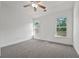 Bright bedroom with ample natural light and serene views at 4050 Bonnett Creek Ln, Hoschton, GA 30548