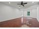 Bonus room featuring neutral walls, recessed lighting, a ceiling fan, and an exterior door to backyard at 4050 Bonnett Creek Ln, Hoschton, GA 30548