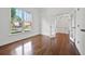 Bright office featuring hardwood floors, large windows, and classic trim work at 4050 Bonnett Creek Ln, Hoschton, GA 30548