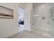 Bathroom featuring a glass-enclosed shower and seamless flow into the main bedroom at 7310 Winderlea Ln, Cumming, GA 30040
