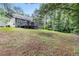 Spacious backyard with a deck, ideal for outdoor gatherings and relaxation at 112 Laguna Springs Dr, Woodstock, GA 30188