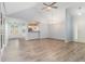 Dining Room with stylish floors, chandelier and kitchen bar at 112 Laguna Springs Dr, Woodstock, GA 30188