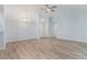 Open-concept living room boasting vaulted ceilings and modern flooring at 112 Laguna Springs Dr, Woodstock, GA 30188