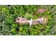 Aerial view of estate featuring expansive grounds, mature trees, and circular driveway at 130 Brooklet Way, Brooks, GA 30205