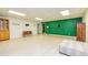 Finished basement boasts spacious design with recessed lighting and neutral floors perfect for recreation at 130 Brooklet Way, Brooks, GA 30205