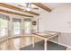 Charming dining area with wood floors, a ceiling fan, and natural light streaming through the windows at 130 Brooklet Way, Brooks, GA 30205