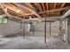 Unfinished basement with concrete floor, exposed duct work and block walls at 4309 King Valley Se Dr, Smyrna, GA 30082