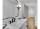 New bathroom features modern vanity and bronze light fixture at 4309 King Valley Se Dr, Smyrna, GA 30082