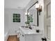 Renovated bathroom highlighting modern vanity and stylish mirror at 4309 King Valley Se Dr, Smyrna, GA 30082