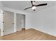 Bright bedroom with hardwood floors, closet, and ceiling fan at 4309 King Valley Se Dr, Smyrna, GA 30082