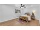 Well-lit bedroom with hardwood floors, a bed, and classic decor at 4309 King Valley Se Dr, Smyrna, GA 30082