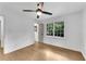 Sunlit bedroom features hardwood floors and white trim window at 4309 King Valley Se Dr, Smyrna, GA 30082
