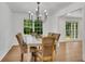Dining room with large windows providing natural light, and seating for six at 4309 King Valley Se Dr, Smyrna, GA 30082