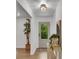 Inviting entryway with hardwood floors, decorative lighting, and a view to the outdoors at 4309 King Valley Se Dr, Smyrna, GA 30082