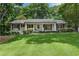 Charming one-story home with a lush front lawn and inviting curb appeal at 4309 King Valley Se Dr, Smyrna, GA 30082
