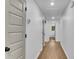 Bright hallway with hardwood floors and access to multiple rooms at 4309 King Valley Se Dr, Smyrna, GA 30082