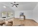 Open-concept living room with vaulted ceiling, large windows, and ample natural light at 4309 King Valley Se Dr, Smyrna, GA 30082