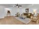 Inviting living room with hardwood floors, neutral decor, and an open concept layout at 4309 King Valley Se Dr, Smyrna, GA 30082