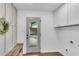 Functional mud room with built-in bench, storage, and access to the garage at 4309 King Valley Se Dr, Smyrna, GA 30082