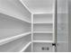 Spacious walk-in pantry with ample shelving for organized storage at 4309 King Valley Se Dr, Smyrna, GA 30082